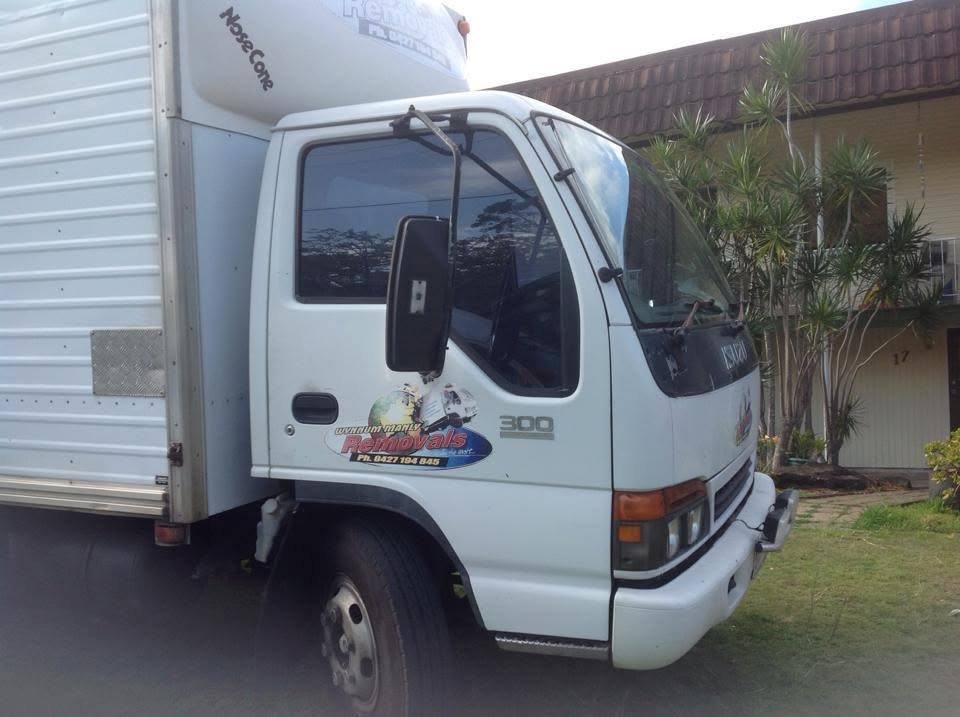 The Wynnum Manly Removals furniture truck parked outside a Brisbane home
